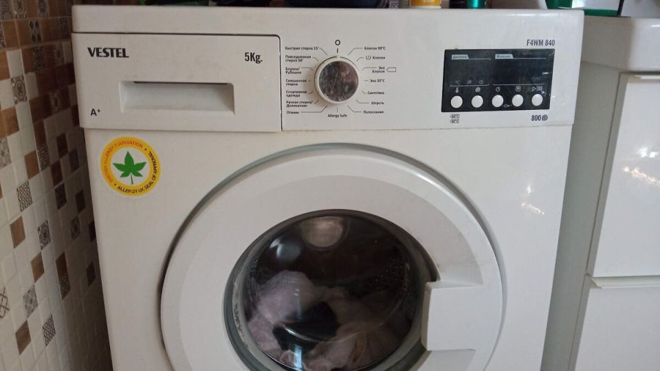 Как быстро открыть дверцу стиральной машины во время стирки