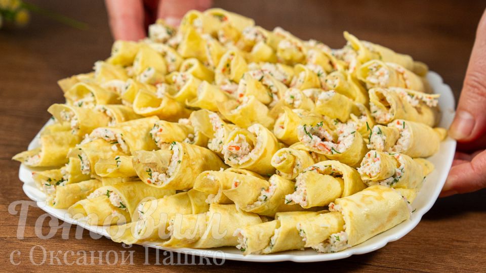 Вкусные яичные рулетики с крабовыми палочками для вашего стола